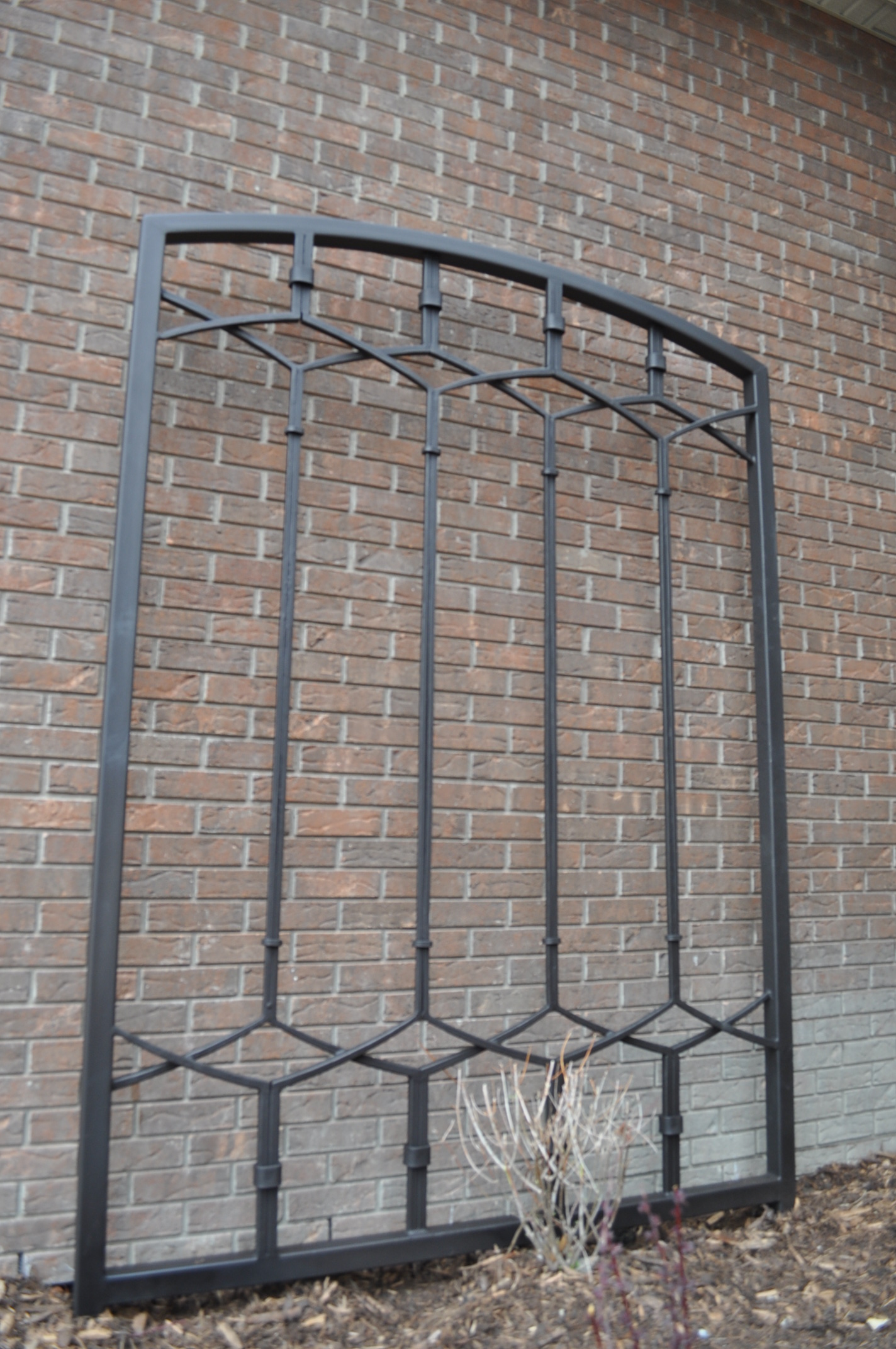 hand trellises, custom ironwork, artistic iron work